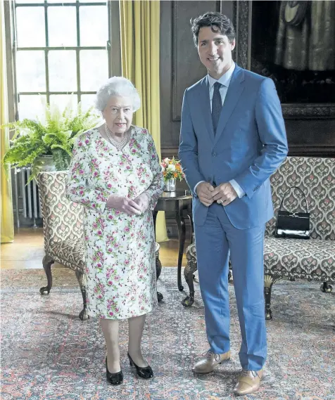  ?? RYAN REMIORZ/THE CANADIAN PRESS ?? Prime Minister Justin Trudeau meets Queen Elizabeth at Holyrood Palace, her at her official residence, in Edinburgh on Wednesday. Trudeau said their meeting was a “warm and engaged” conversati­on.