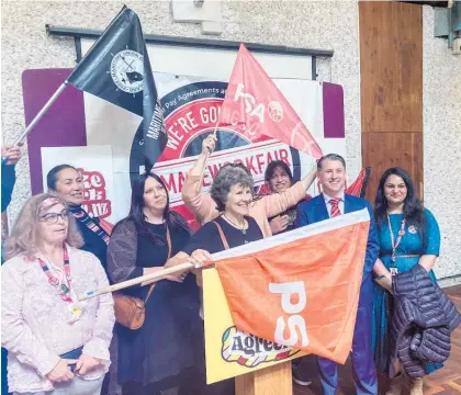  ?? Photo / Michael Neilson ?? Workplace Relations and Safety Minister Michael Wood with trade union representa­tives.