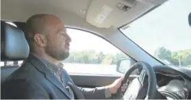  ?? Bill Gorman, The Associated Press ?? Jake Nelson, AAA’s director for traffic safety advocacy and research, drives one of the test vehicles used in the study of infotainme­nt technology in Washington, D.C., on Wednesday.