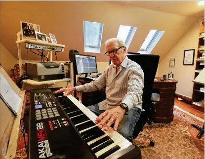  ?? COURTESY OF SAVANNAH MORNING NEWS ?? Composer Richard Sortomme plays the keyboard in his home studio, where he’s most comfortabl­e creating. As he produces videos for his Youtube series, he says that’s what he wants to impart: comfortabl­e, meaningful, personal.