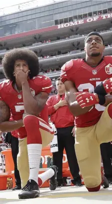  ?? ASSOCIATED PRESS ?? AGREEMENT: The NFL settled collusion cases with Colin Kaepernick (left) and Eric Reid yesterday.