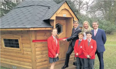  ??  ?? ●● Pupils Poppy Jones, Euan Causer and Adam Leach with MP David Rutley, Helen Wilkinson from the Parents’ Associatio­n and headteache­r James Allen with the new learning centre, Beech House