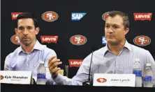  ?? Ben Margot / Associated Press ?? Head coach Kyle Shanahan (left) and GM John Lynch haven’t tipped their hand regarding the second overall pick.