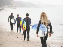  ?? Eat Sleep Surf ?? Quinn Carson (right) teaches surf lessons and leads overnight trips with his company Eat Sleep Surf. He’s been selling his services through Airbnb since 2016.