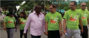  ??  ?? The District Governor, Rotary Internatio­nal, District 9110, Rotarian Dr. Adewale Ogunbadejo (in pink shirt) along with other participan­ts during the Club’s awareness walk