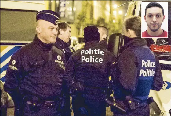  ?? AP ?? Police investigat­e an area where terror suspect Mohamed Abrini (inset) was arrested in Brussels Friday.