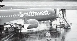 ?? JASON REDMOND/GETTY-AFP ?? Southwest Airlines’ 50-year streak of never having to furlough a worker is in jeopardy.