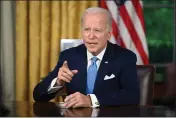  ?? JIM WATSON — POOL VIA AP ?? President Joe Biden addresses the nation from the Oval Office of the White House in Washington on Friday about the budget deal that lifts the federal debt limit and averts a U.S. government default.