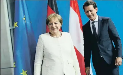  ?? SEAN GALLUP / GETTY ?? La canciller alemana, Angela Merkel, y el austriaco, Sebastian Kurz, ayer en Berlín