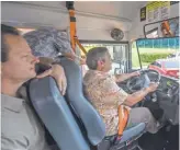  ?? RICK CRUZ, PACIFIC DAILY NEWS ?? Gov. Eddie Calvo takes a drive around Adelup Park in a school bus with a security camera.