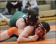  ?? MEDIANEWS GROUP PHOTO ?? Methacton’s Brody Borkowski, top, wrestles Perkiomen Valley’s Grant Euker earlier this season.