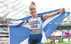  ?? Picture: Getty ?? Maria Lyle celebrates winning her second medal.