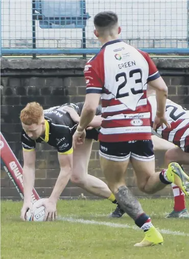  ??  ?? HIGH POINT: Connor McGrath scores for Fax. Pic: Simon Hall/OMH Rugby Pics