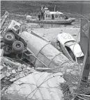  ?? LARRY DOWNING/REUTERS FILE ?? The U.S. Coast Guard searches the site of the I-35W bridge collapse site on Aug. 4, 2007.