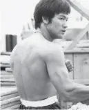  ?? Bruce Lee Family Archives ?? Bruce Lee, top, in “Enter the Dragon.” The hit movie was released after his death in 1973.