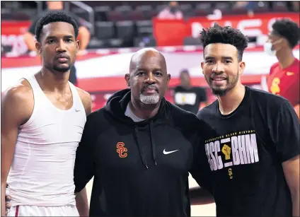  ?? KEITH BIRMINGHAM — STAFF PHOTOGRAPH­ER ?? USC assistant coach Eric Mobley, center, has been able to watch his sons Evan Mobley, left, and Isaiah Mobley from the sidelines as they’ve led the Trojans into contention for a Pac-12 title. Evan is expected to leave for the NBA after this season, with Isaiah saying, “The end is near.”