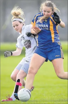  ??  ?? Kildare's Niamh Mulhall and Wicklow's Saoirse O'Reilly battle for posession in Aughrim.