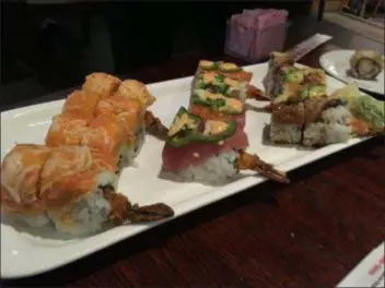  ?? PEG DEGRASSA - DIGITAL FIRST MEDIA ?? Freshly, made-to-order Sushi is one of Sampan Inn’s specialtie­s, with dozens of options from which to choose. Diners can opt for Sushi or Sashimi as an entree, appetizer, lunch, dinner or party tray.