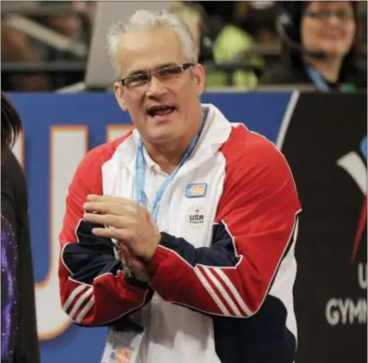  ?? THE ASSOCIATED PRESS ?? Gymnasts who were molested by sports doctor Larry Nassar are reserving harsh criticism for former U.S. Olympic coach John Geddert, who for years had Nassar treat their injuries at his elite Twistars club near Lansing.