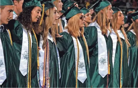  ??  ?? Santa Fe High School’s graduating class received their diplomas Friday night while rememberin­g the May 18 mass shooting that killed eight students and two teachers.