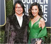  ?? Jon Kopaloff / Getty Images ?? Kevin Kwan and Michelle Yeoh