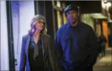  ?? GLEN WILSON/SONY, COLUMBIA PICTURES VIA AP ?? This image released by Columbia Pictures shows Melissa Leo, left, and Denzel Washington in a scene from “Equalizer 2.”