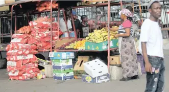  ?? | DOCTOR NGCOBO
African News Agency (ANA) ?? SOME informal traders returned to business in Warwick Avenue after regulation­s were amended last week to allow them to trade.