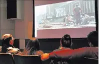  ?? JASON BEAN/ LAS VEGAS REVIEW-JOURNAL ?? College of Southern Nevada students, from left, Jonathan Antonio, Vivien Wu, Michelle Mendez-Yela and Martin D. Leyva watch the movie “Sin Nombre” on Wednesday with other members of the school’s new Spanish Club.