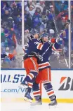  ?? ADAM HUNGER/ASSOCIATED PRESS ?? New York Rangers left wing J.T. Miller (10) celebrates with teammate Mats Zuccarello after scoring the winning goal in overtime on Monday.