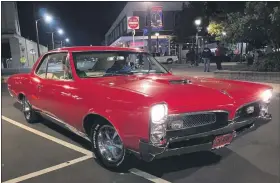  ??  ?? Classic cars roll through Lansdale during a socially-distanced Lansdale Cruise Night on Saturday.