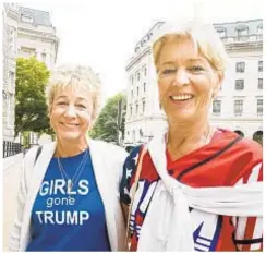  ??  ?? Mary Jo Smith (left) and Karen Salvi, attending Women For America First Summit in Washington, dismissed sex abuse allegation­s against President Trump and his Supreme Court pick, Brett Kavanaugh.