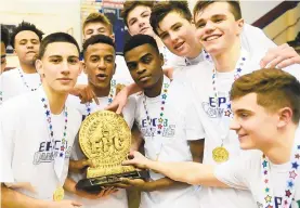  ?? MORNING CALL FILE PHOTO ?? The Bethlehem Catholic boys basketball team, seen celebratin­g last year's Eastern Pennsylvan­ia Conference title at Liberty's Memorial Gym, might be talented enough to repeat this winter.