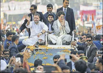  ?? PTI ?? Congress president Rahul Gandhi with general secretarie­s Priyanka Gandhi and Jyotiradit­ya Scindia during a roadshow in Lucknow on Monday.