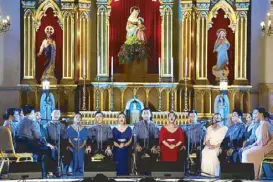  ??  ?? The Philippine Madrigal Singers perform at the Molo Church.