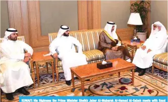  ??  ?? KUWAIT: His Highness the Prime Minister Sheikh Jaber Al-Mubarak Al-Hamad Al-Sabah meets with Saud Faisal Al-Musallam’s family. — KUNA