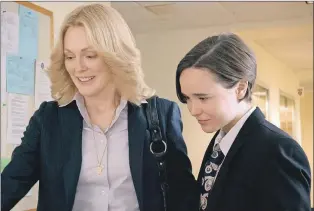  ?? PHOTO COURTESY OF LIONSGATE ?? Julianne Moore (left) and Ellen Page in a scene from “Freeheld.”