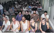  ?? BASSEM TELLAWI / THE ASSOCIATED PRESS FILES ?? Syrian prisoners in Damascus. A report says more than 17,000 detainees have died in government custody.