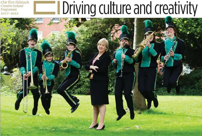  ??  ?? At the announceme­nt of €210,000 for the Music Capital Scheme (from left): Christophe­r O’Brien, trombone (15); Sarah Jane O’Brien, trumpet (10); Aine Rooney, saxophone (11); Heather Humphreys TD, Minister for Arts, Heritage and the Gaeltacht; Shannon...