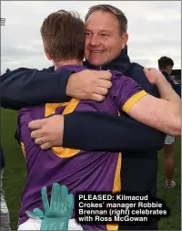  ?? ?? PLEASED: Kilmacud Crokes’ manager Robbie Brennan celebrates with Ross McGowan