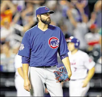  ?? ELSA / GETTY IMAGES ?? Cubs pitcher Jason Hammel had a 6-foot high stack of chips delivered to his Wrigley Field locker courtesy of Utz, a Pennsylvan­ia-based chip company.