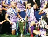  ?? ?? Good job: Joe Simmonds, above right, celebrates with the Champions Cup and, right, brother Sam playing for Montpellie­r