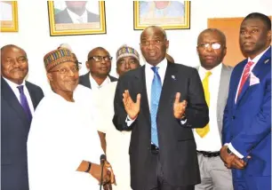  ?? Photo: QSRBN ?? Minister of Power, Works and Housing, Mr. Babatunde Raji Fashola (3rd left) with the Chairman of the newly reconstitu­ted Quantity Surveyors Registrati­on Board of Nigeria (QSRBN), Mallam Murtala Aliyu (2nd right) after the inaugurati­on of the board in Abuja on Tuesday.