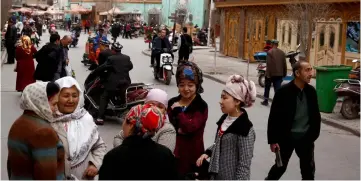  ??  ?? File photo shows people mingle in the old town of Kashgar, Xinjiang Uighur Autonomous Region, China. — Reuters photo