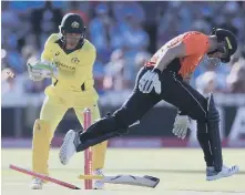  ??  ?? England batsman Jason Roy narrowly avoids a run-out chance.