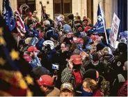  ?? Erin Schaff / New York Times ?? A pro-Trump mob storms the Capitol on Jan. 6 to halt certificat­ion of the Nov. 3 election results.