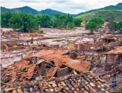 ?? ?? Devastatin­g: A tsunami of iron waste killed 19 people and obliterate­d villages in Brazil