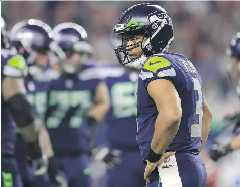  ?? RONALD MARTINEZ/GETTY IMAGES ?? The Seattle Seahawks will make the playoffs only by beating the Arizona Cardinals on Sunday in the regular-season finale and getting a helping hand from a Carolina Panthers victory over the Atlanta Falcons.