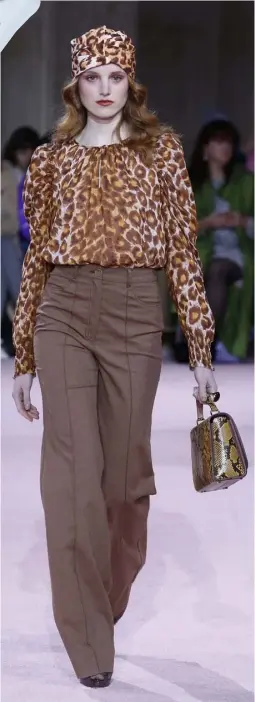  ??  ?? ANIMAL print top, bag and headscarf.