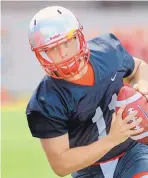  ?? JIM THOMPSON/JOURNAL ?? Lobos senior quarterbac­k Coltin Gerhart, who missed six games with a foot injury, has been named the starter on Saturday.