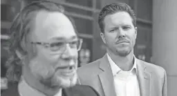  ?? TOM TINGLE/THE REPUBLIC FILE ?? Kurt Altman, left, an attorney for Paul Petersen, right, speaks to the press on the steps of Maricopa County Superior Court in 2019.